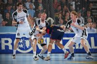 Karabatic, Lundstr�m und Lund bei der Abwehrarbeit.
